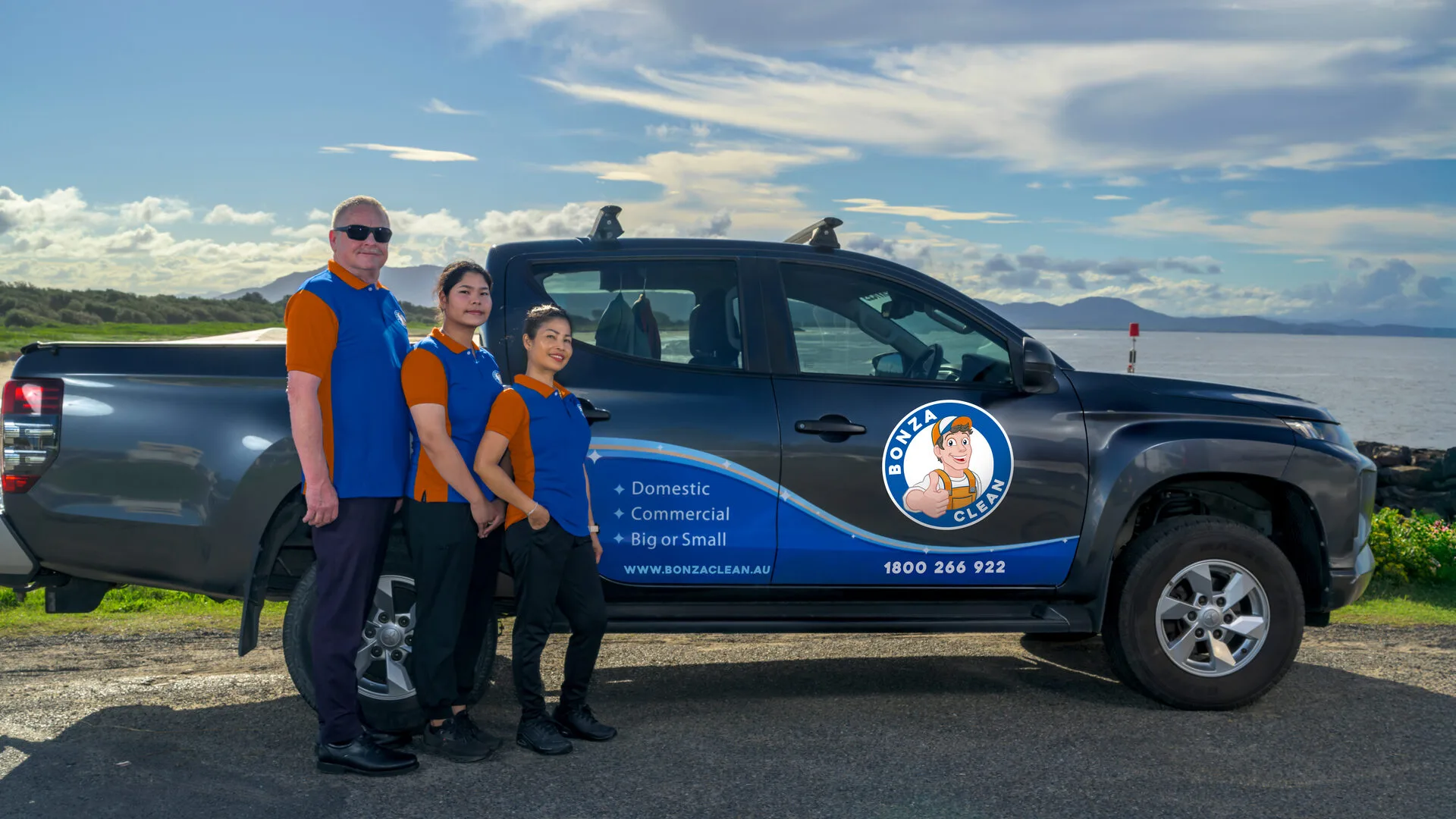Bonza Clean team beside their branded service vehicle